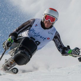 NZ Paralympian Corey Peters competing in an adaptive ski race